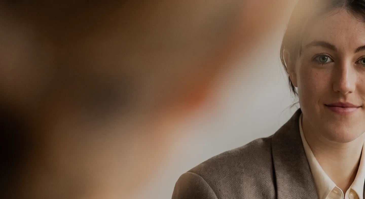 A healthcare executive smiling